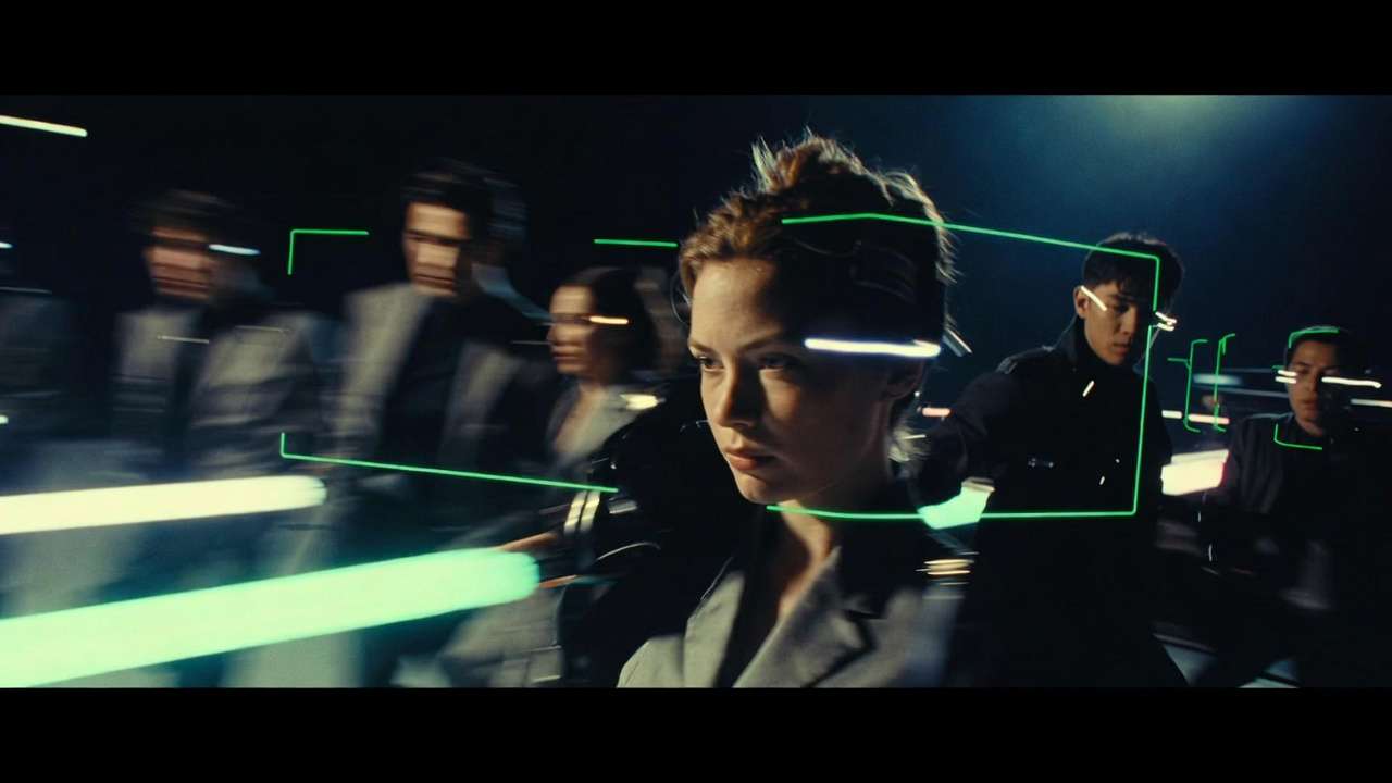 Woman and group, neon green tracking boxes on heads, motion blur
